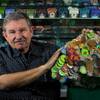 Michael Spinetti of Spinettis Gaming Supplies holds a chunk of concrete-covered poker chips from the the Pioneer Hotel & Gambling Hall in Laughlin. The concrete was recovered from a building foundation by an unnamed source and now is sold in his shop on Monday, Oct. 28, 2013.